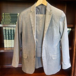 CHAPS 2 piece suit.  Size l4 regular boys.  Color gray.